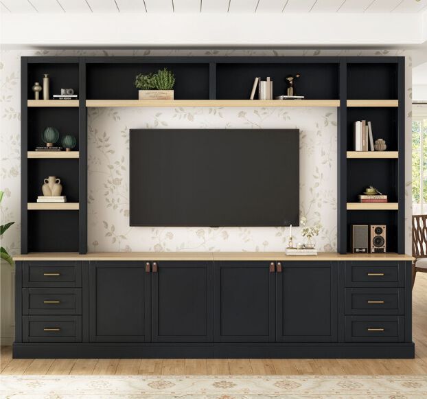 A farmhouse style large black entertainment center with wooden colored shelving.